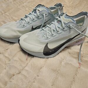 Nike Running Shoes in Light Mint with Black Swoosh